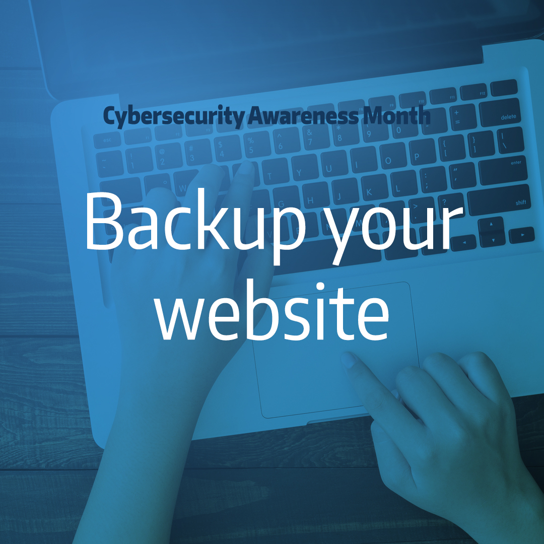 hands typing on computer with text overlay "backup your website"