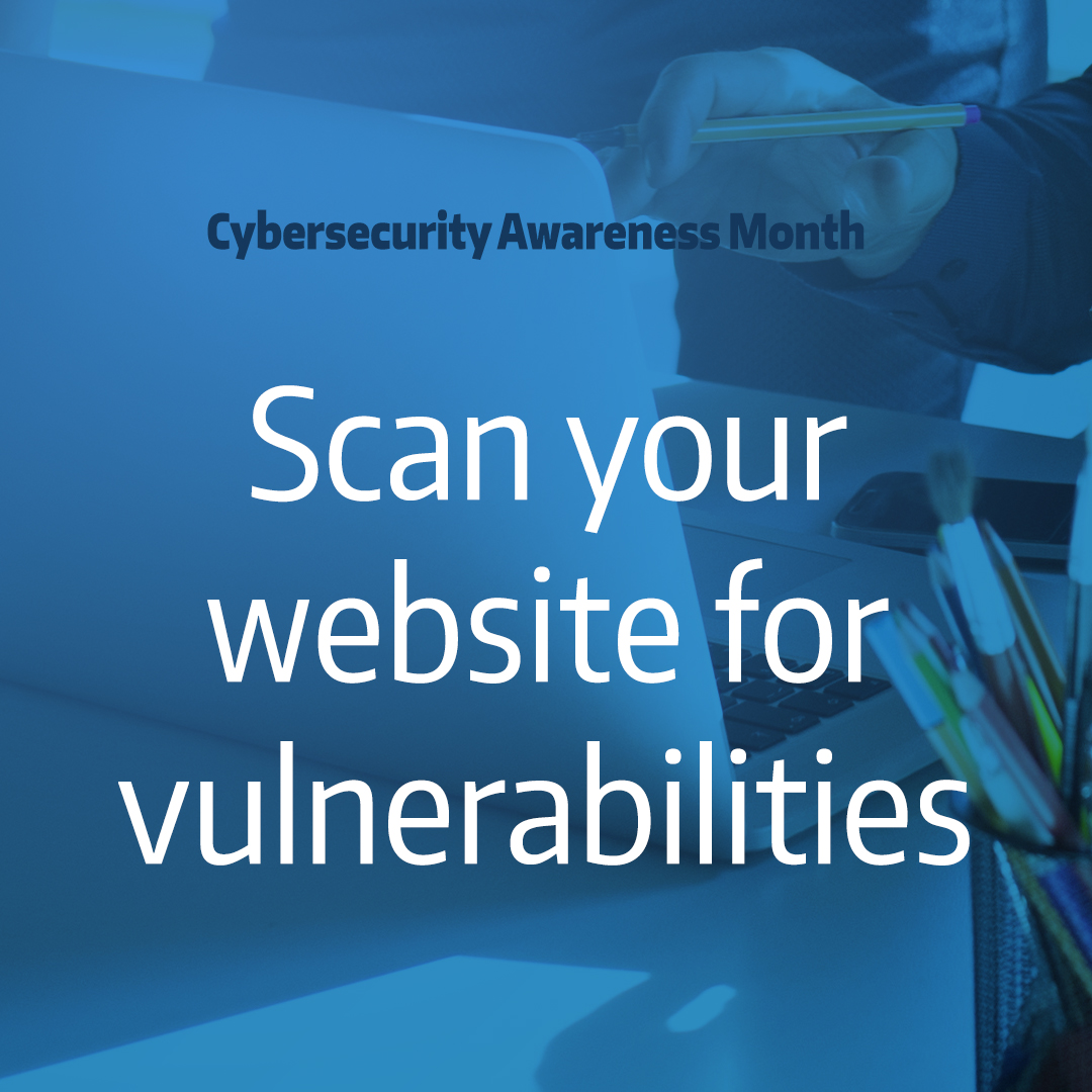 businessmans hand gesturing at laptop with text overlay "scan your website for vulnerabilities"