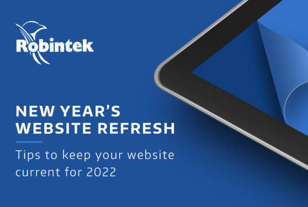 tablet on blue background looking like the design is peeling off to reveal something new with the text "New Year's Website Refresh: tips to keep your website current for 2022"